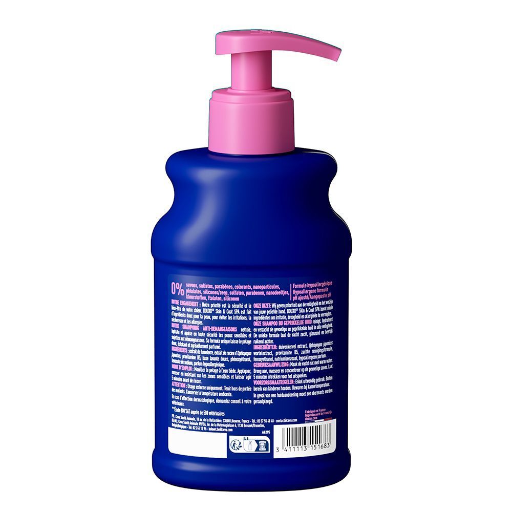 Dos d'un flacon bleu avec pompe rose. Texte et informations sur le produit.