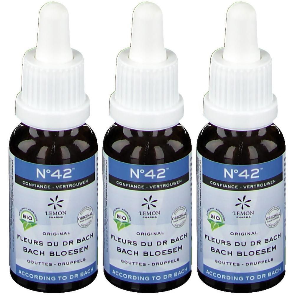 Trois flacons de Fleurs de Bach Bio N°42 Confiance. Liquide brun dans des flacons en verre avec bouchon blanc et pipette. Étiquettes bleues.
