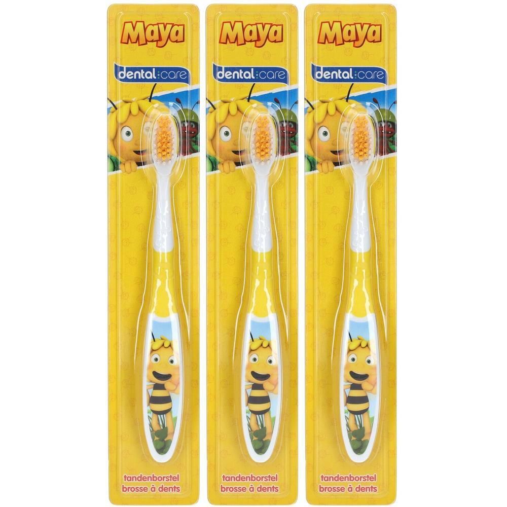 Trois brosses à dents jaunes pour enfants, emballées. Inscription : Maya, dental care, l'abeille Maya. Soies oranges.