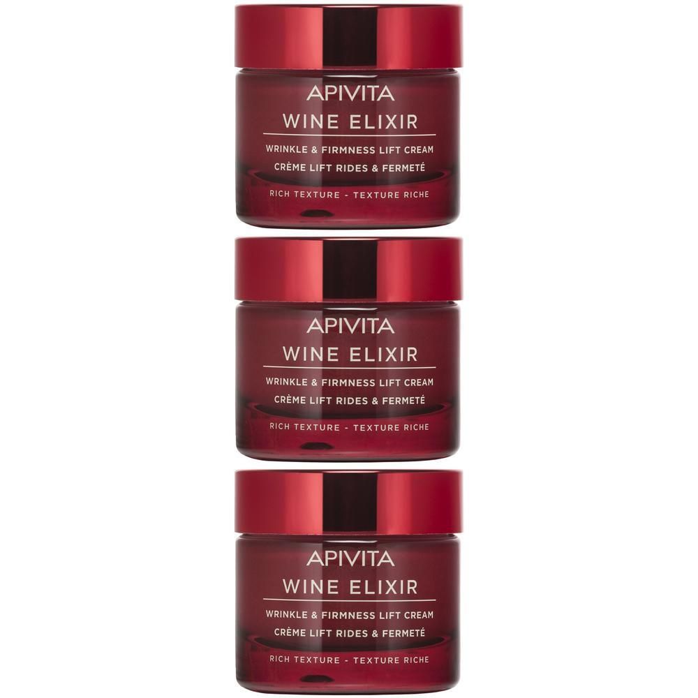 Drie potjes crème, rood en zwart. Opschrift: APIVITA WINE ELIXIR. Crème Lift Rides & Fermeté.