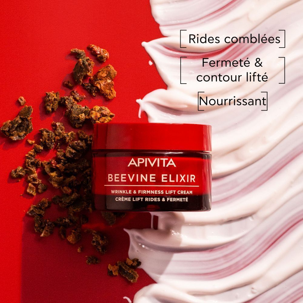 Pot de crème à couvercle rouge. Texte: APIVITA BEEVINE ELIXIR. Crème Lift Rides & Fermeté. Sur fond rouge.