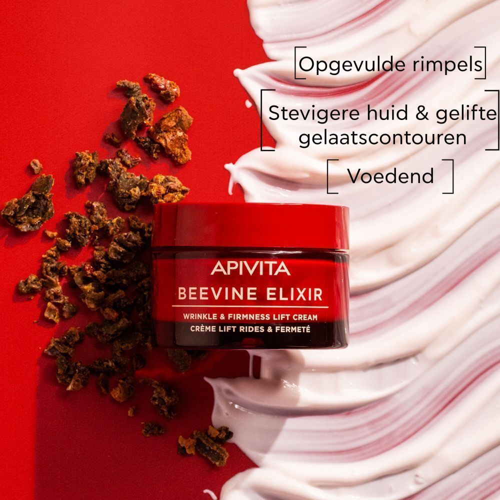 Crèmepotje naast een groene vuilnisbak. Tekst: APIVITA BEEVINE ELIXIR. 100% recyclebaar.