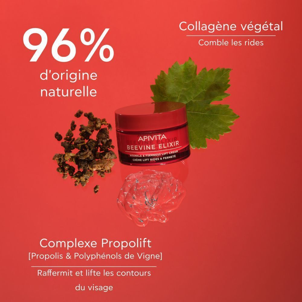 Pot de crème à couvercle rouge. Texte: APIVITA BEEVINE ELIXIR. 96% d'origine naturelle. Sur fond rouge.