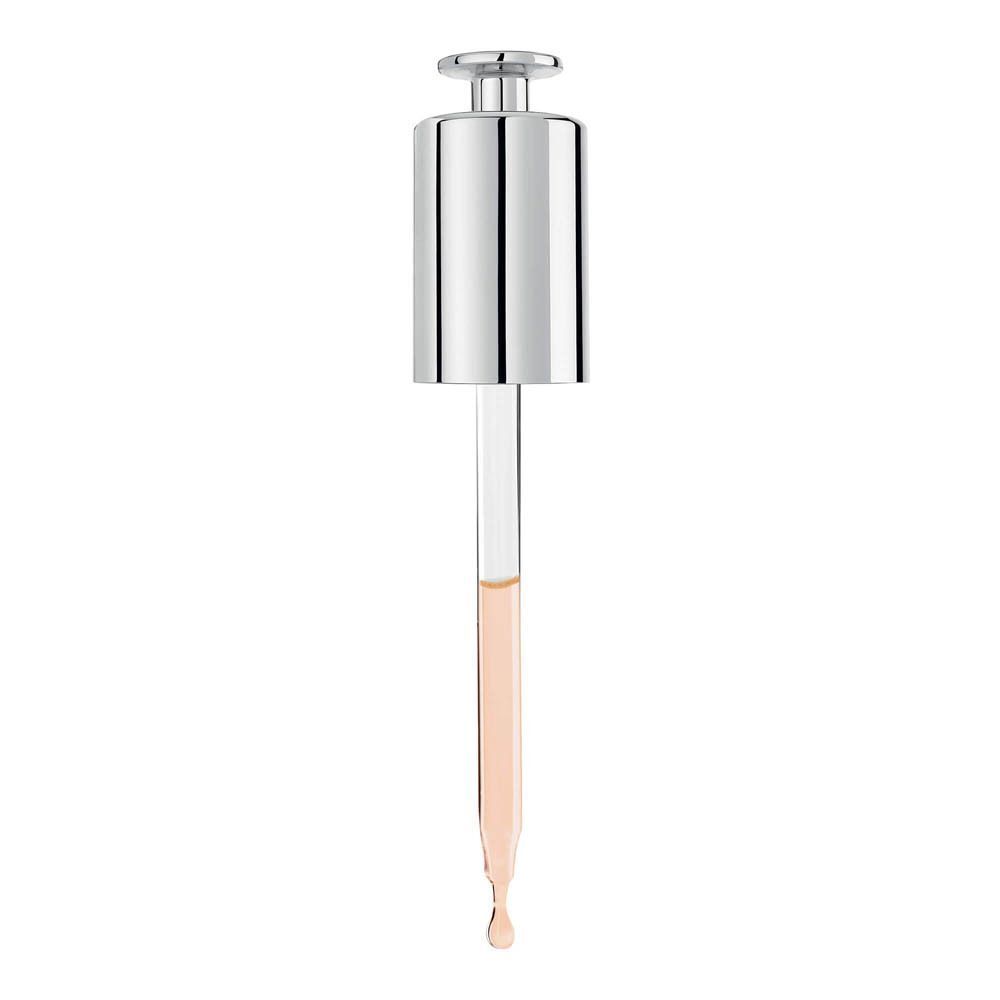 Pipette avec sérum. Gouttes qui tombent. Bouchon argenté.