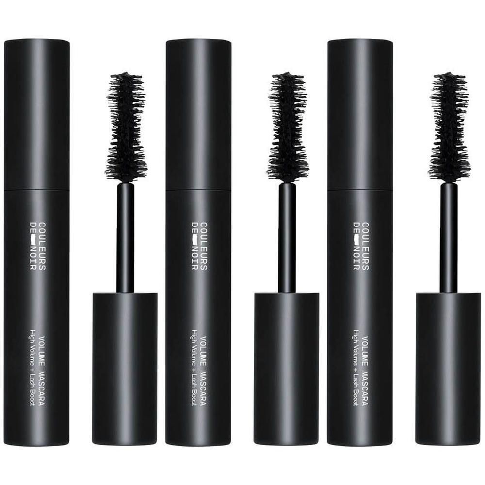 Zes zwarte mascaratubes met borstels. Opschrift: Couleurs de Noir, Volume Mascara, Noir 01.