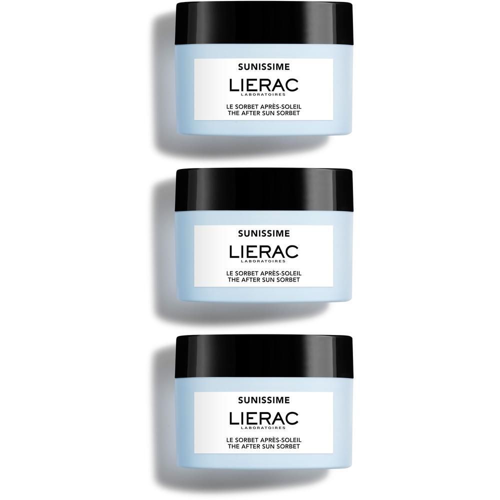 Drie blauwe potten met zwarte deksels. Op de voorkant staat "SUNISSIME" en "LIERAC". Daaronder "LE SORBET APRES SOLEIL". 