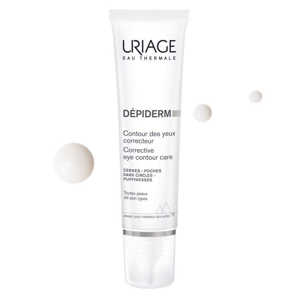 Tube Uriage Dépiderm oogcontourverzorging. Wit, blauwe en zwarte tekst. Drie crème druppels.