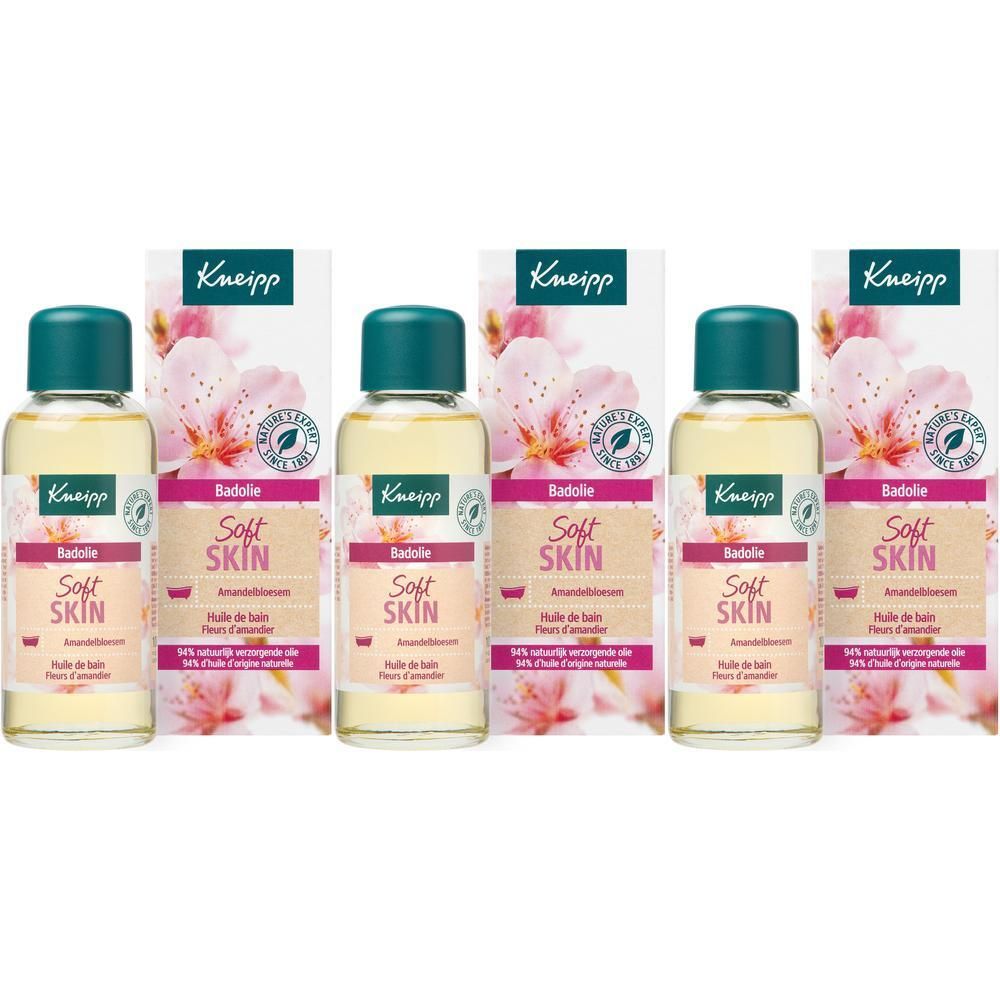 Trois flacons et emballages. Flacons avec bouchon vert, liquide jaune. Emballage avec motif floral et texte.
