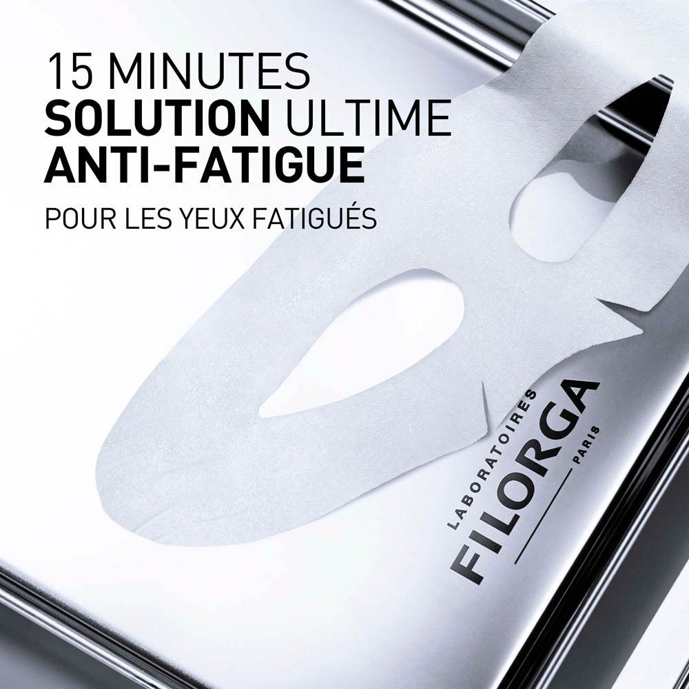 Masque pour les yeux blanc sur une surface argentée. Texte: 15 minutes, Solution Ultime Anti-Fatigue, Pour les yeux fatigués.