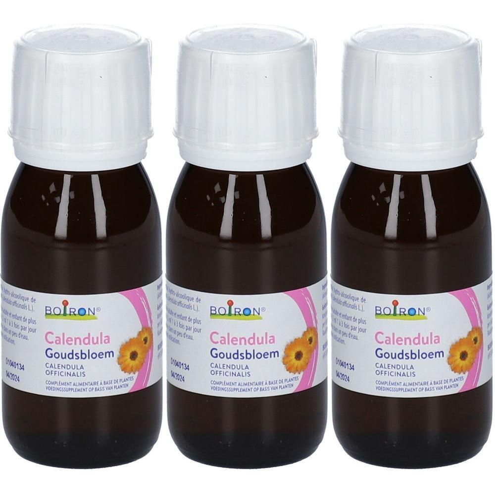 Trois flacons bruns avec des bouchons blancs. Étiquettes avec "BOIRON Calendula Goudsbloem".