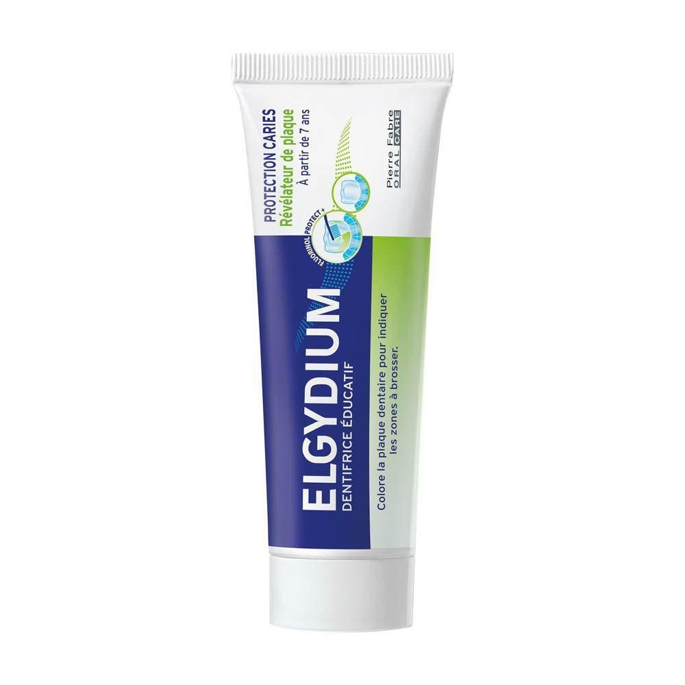 Tube de dentifrice blanc, bleu et vert. Inscription ELGYDIUM, Dentifrice Éducatif. Protection Caries.