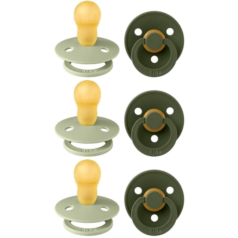 Trois sucettes vertes et jaunes. Forme ronde, tétine en latex, anneau. Logo BIBS.