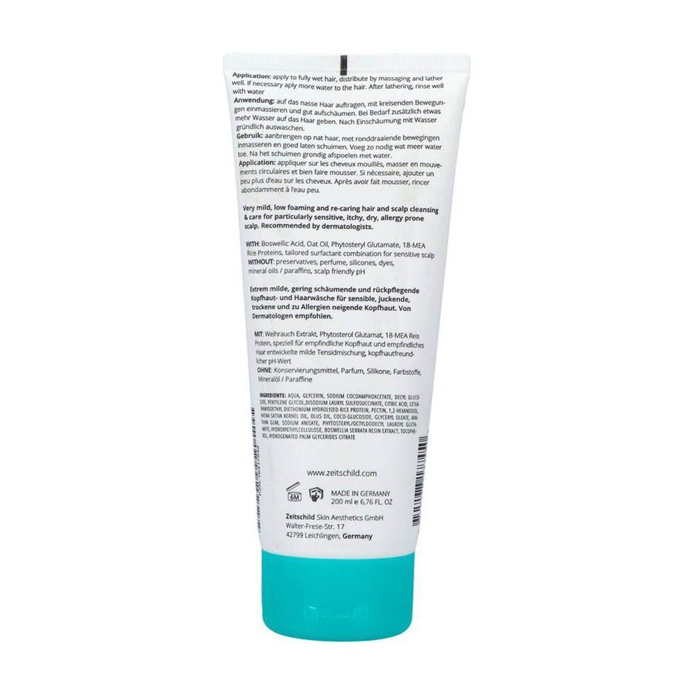 Dos d'un tube de shampooing Zeitschild Derma Systems Sensitive. Texte en plusieurs langues. Base turquoise.