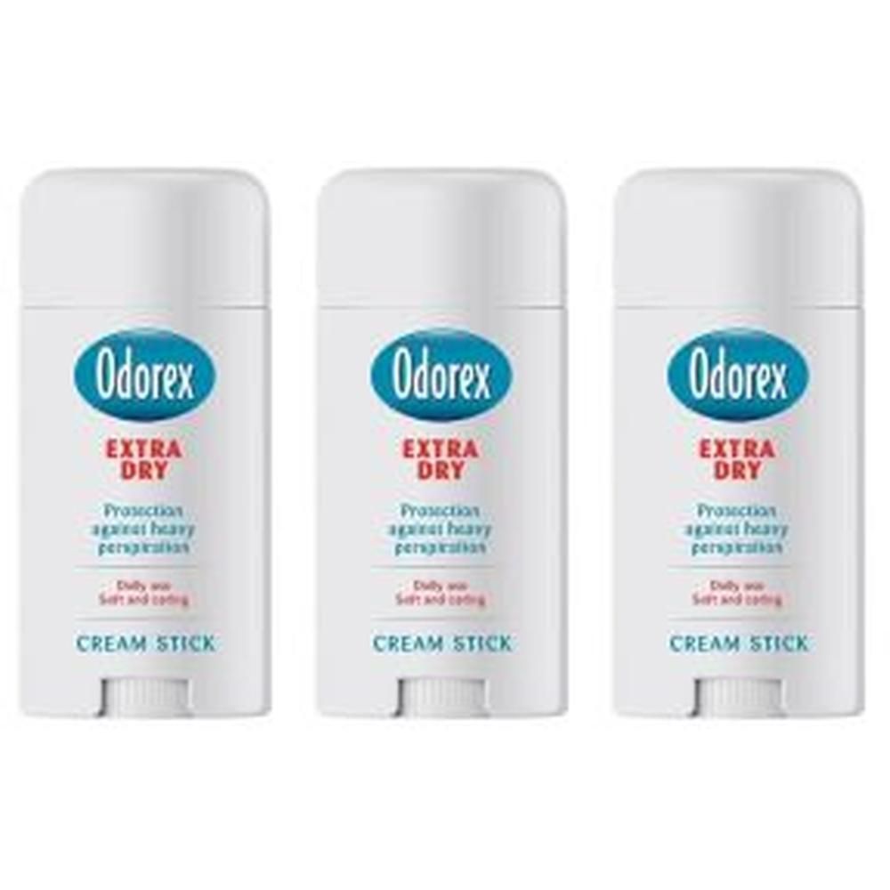 Drie witte deodorant sticks met blauwe tekst "Odorex EXTRA DRY". Tekst: "Protection against heavy perspiration" en "Cream Stick".