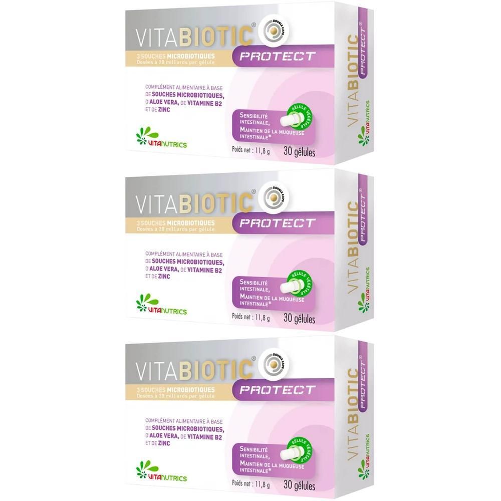 Trois boîtes de Vitabiotic Protect. Emballage blanc avec accents violets et verts. Texte : « 30 gélules » et « Souches microbiennes ».