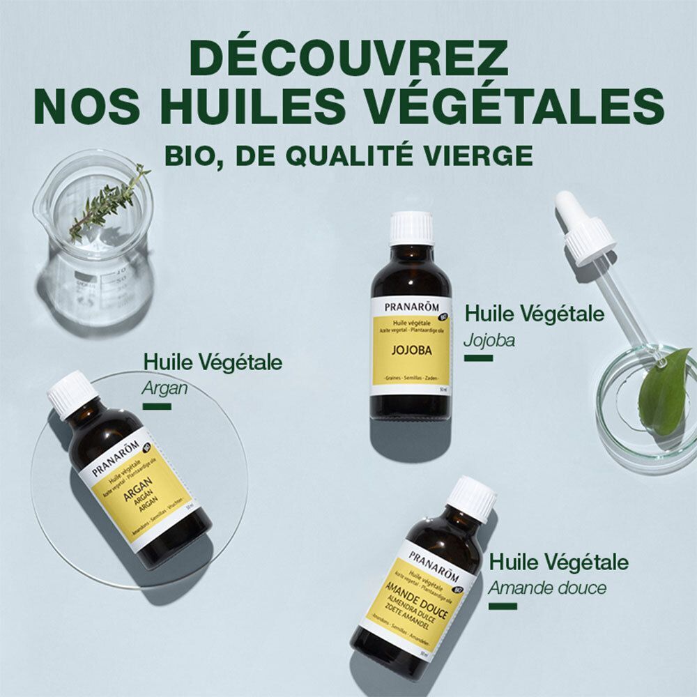 Trois flacons d'huiles végétales. Inscription: Pranarôm. Huile d'argan, huile de jojoba, huile d'amande douce. Label Bio.