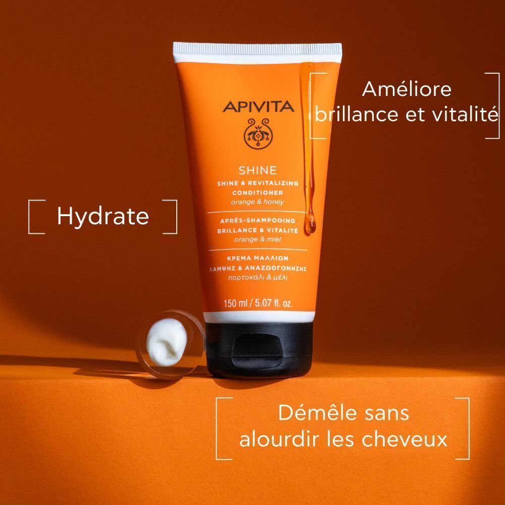 Tube orange Apivita Shine Conditioner. Texte: Shine, Orange & Honey. Texte: Améliore brillance et vitalité.