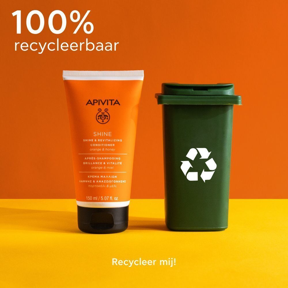 Apivita Shine Conditioner naast een groene vuilnisbak met recycling symbool. Tekst: 100% recyclebaar.