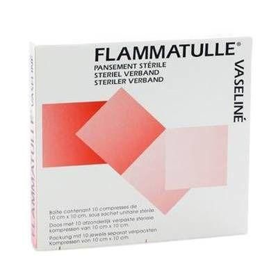 Boîte de Flammatulle. Inscription : PANSEMENT STÉRILE, STERILE VERBAND. Contient 10 compresses stériles de 10 cm x 10 cm.