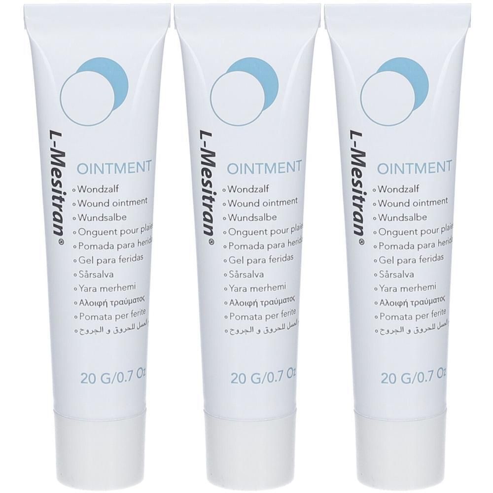 Drie tubes L-Mesitran zalf. Witte tubes met blauwe cirkels en meertalige tekst. Opschrift: Ointment, 20 G/0.7 oz.