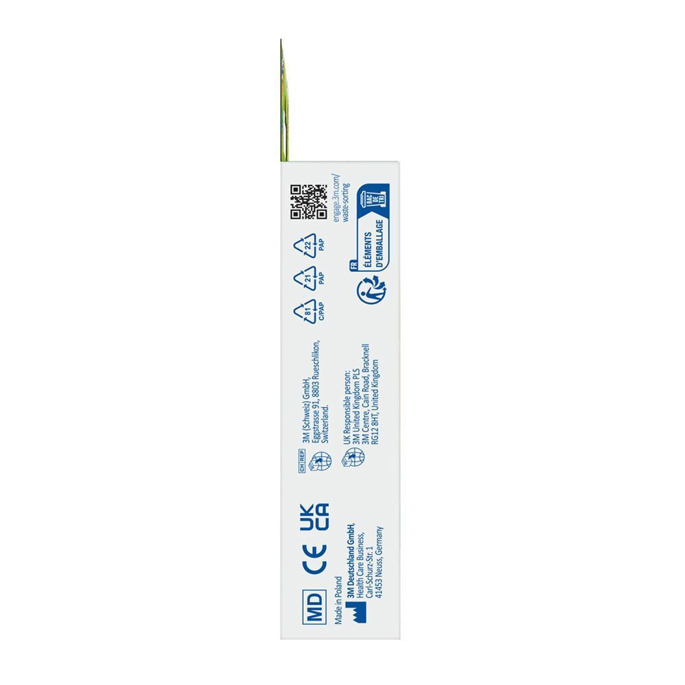 Zijkant van de Nexcare Happy Kids Mix pleisterverpakking. Bevat informatie zoals fabrikant, CE-markering en andere symbolen.