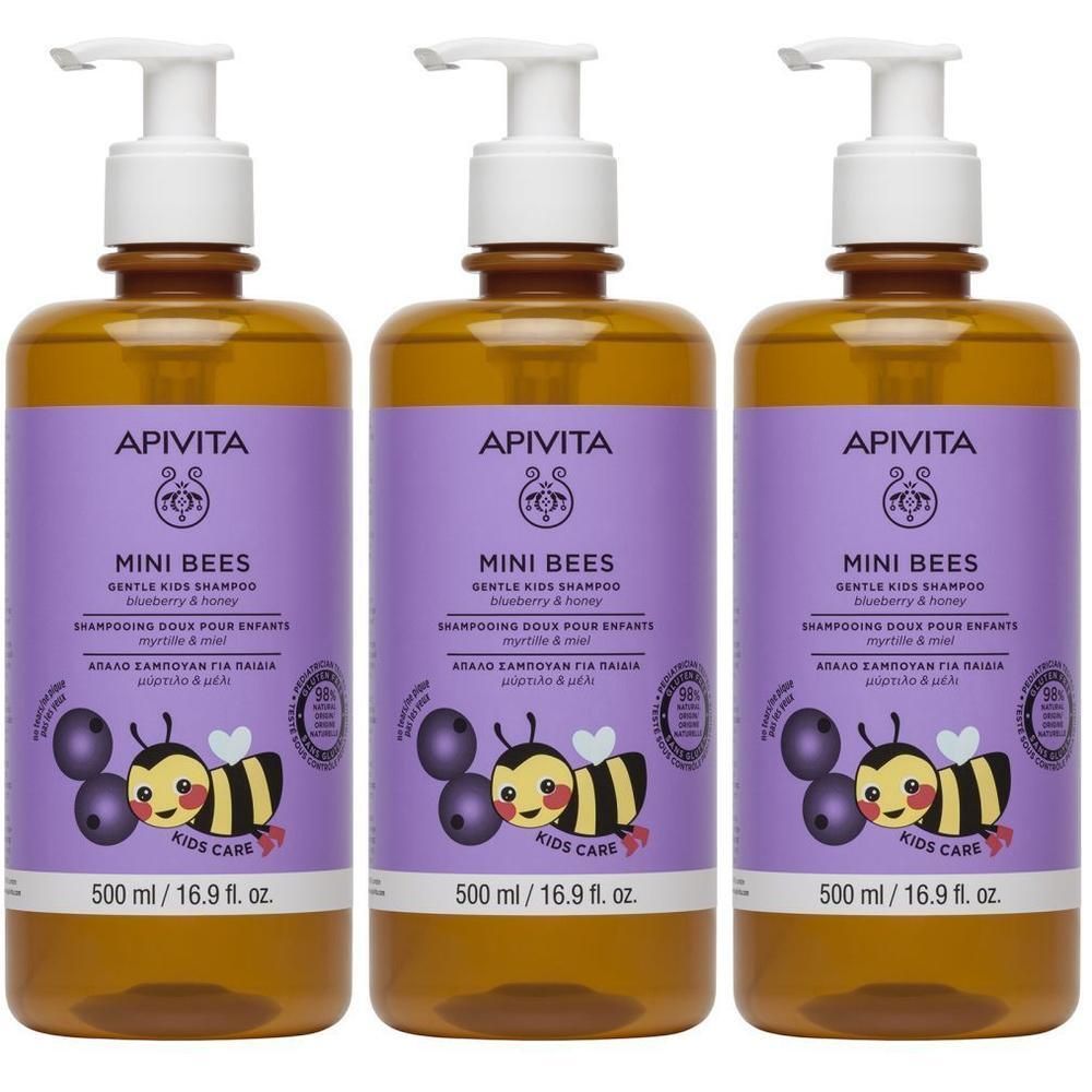Drie flessen Apivita Mini Bees shampoo. Paars etiket met productnaam, bijenillustratie en volumeaanduiding.
