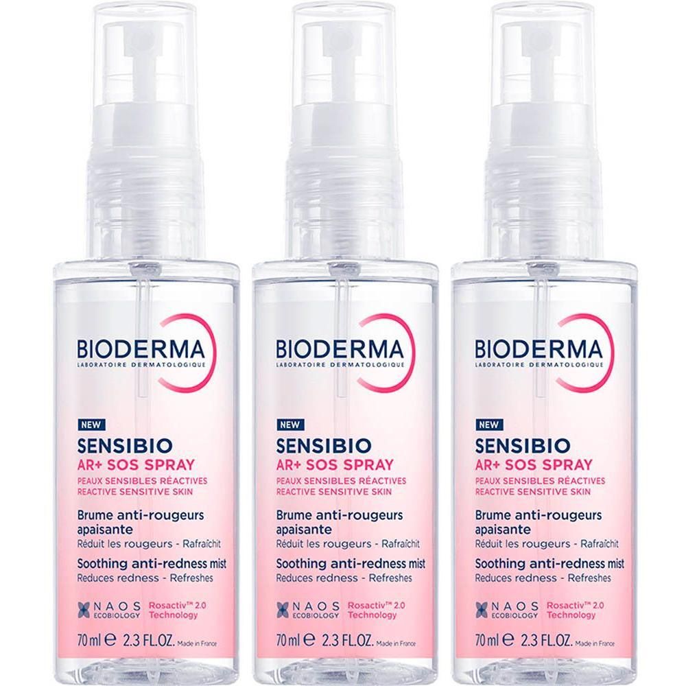 Trois sprays Bioderma Sensibio AR+ SOS. Flacons blancs avec vaporisateur, étiquette rose, texte.