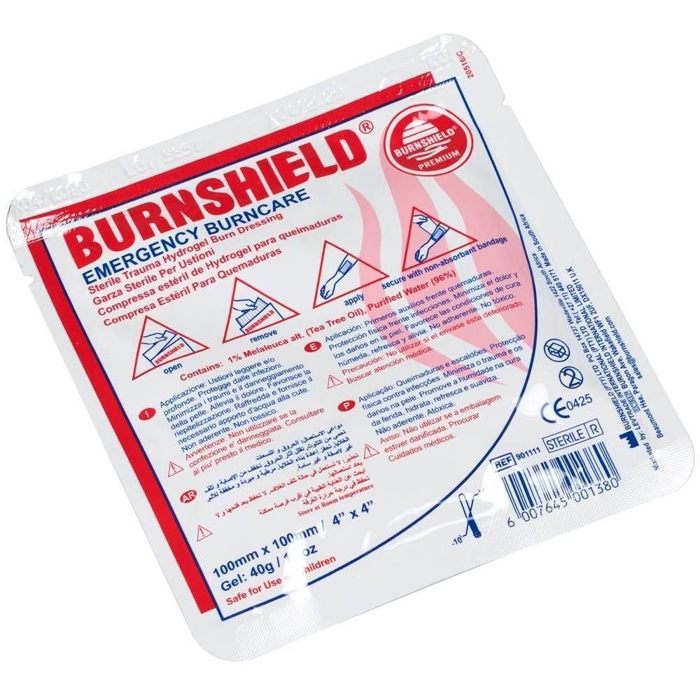 Emballage BURN SHIELD pour brûlures. Forme carrée, blanc avec texte rouge. Contient de l'hydrogel. Dimensions : 100mm x 100mm.