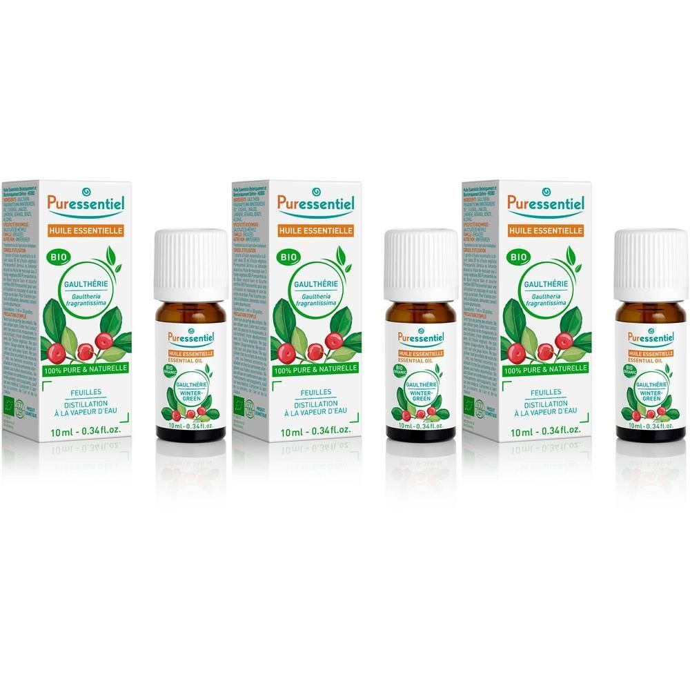 Cinq flacons d'huile essentielle avec emballage. Inscription : Puressentiel, Gaulthérie, 100% pur & naturel.