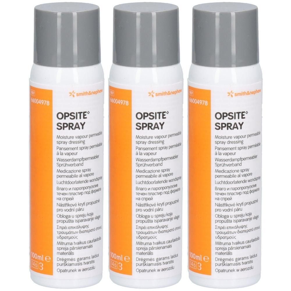 Trois flacons de spray OPSITE. Bouchons gris, étiquettes blanches avec accents orange. Texte : Pansement spray perméable à la vapeur.