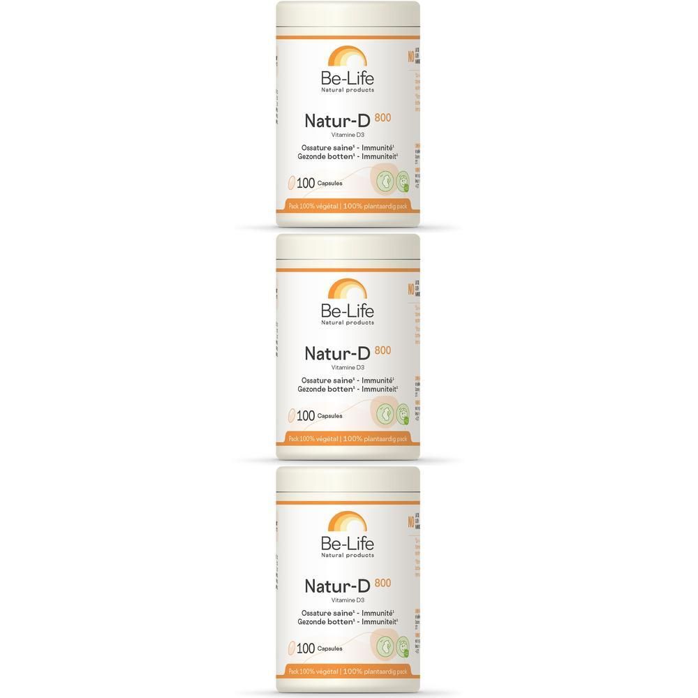 Trois boîtes blanches avec étiquettes orange. Inscription : Be-Life Natur-D 800, 100 capsules. Vitamine D3.