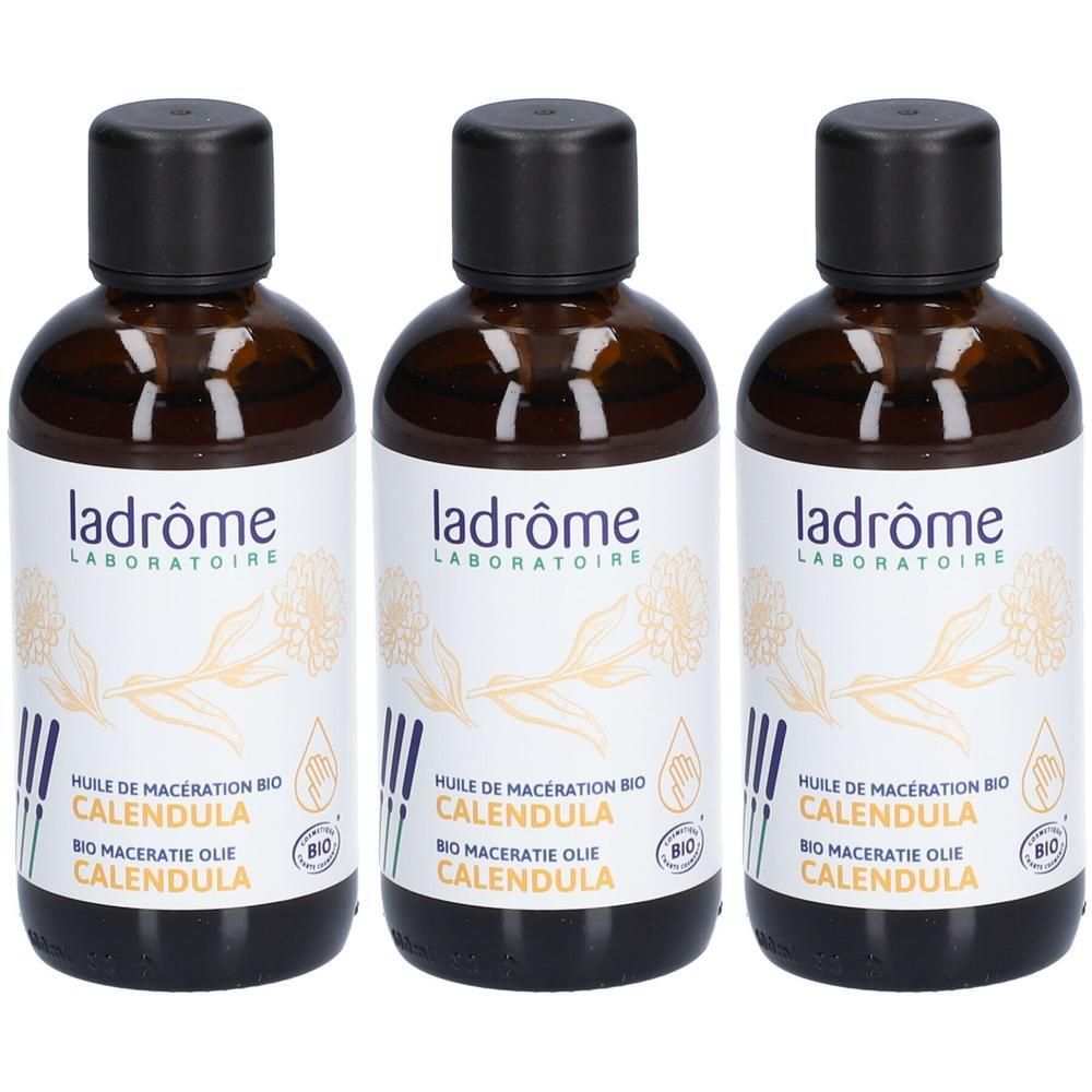 Drie bruine glazen flessen met zwarte dop. Etiket met opschrift "ladrôme LABORATOIRE", "HUILE DE MACERATION BIO CALENDULA".