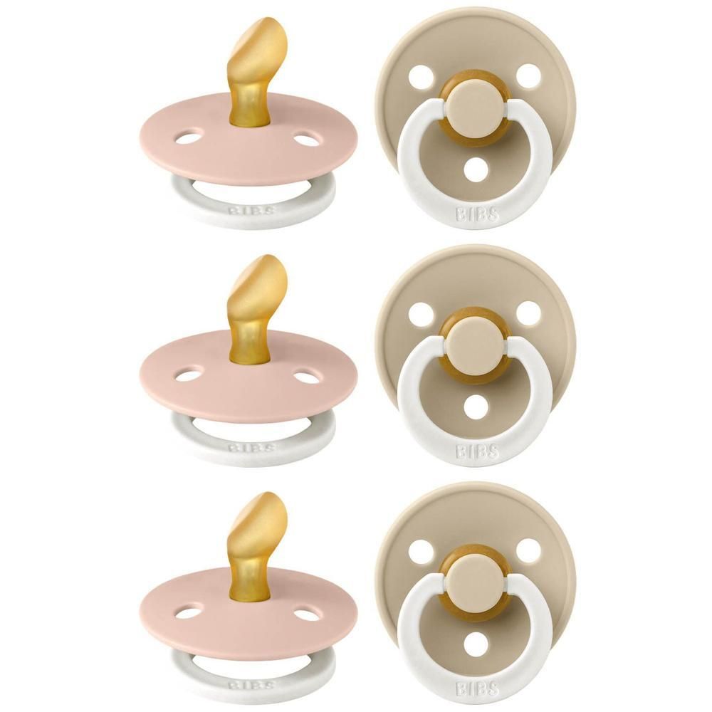Six sucettes, trois roses et trois beiges. Forme ronde, tétine en silicone, anneau et bouclier blancs. Logo BIBS.