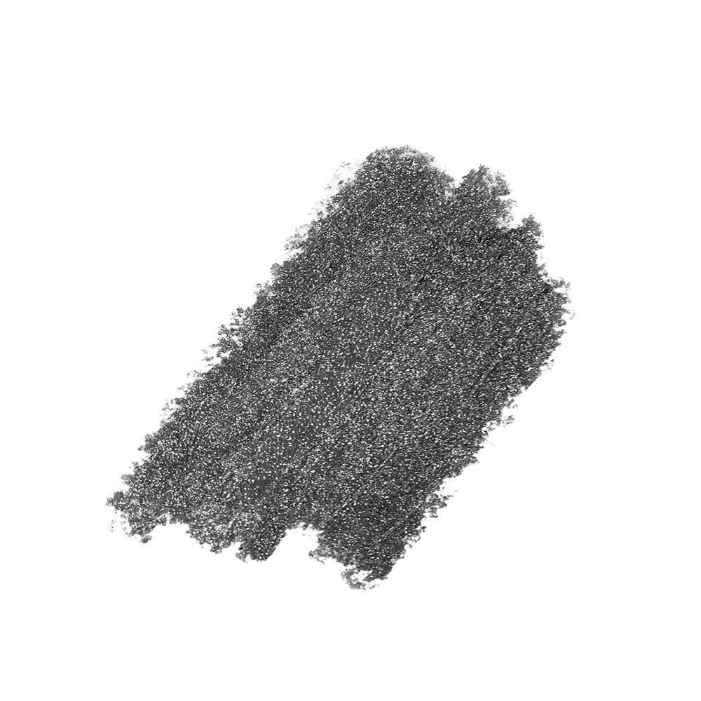 Grijze veeg van een oogpotlood op witte achtergrond.