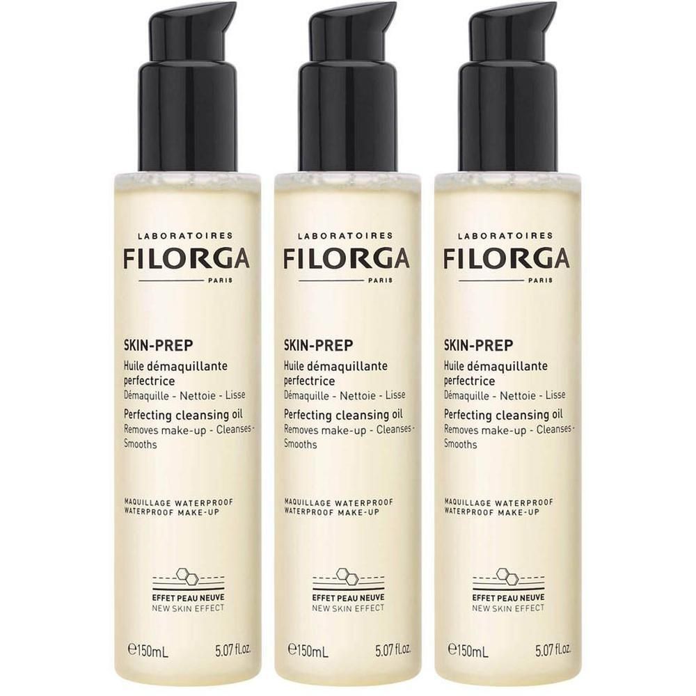 Trois flacons d'huile Filorga SKIN-PREP. Bouchon pompe noir. Texte et logo sur fond blanc.