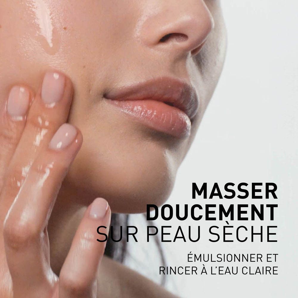 Visage avec main appliquant de l'huile. Texte: MASSER DOUCEMENT SUR PEAU SÈCHE. ÉMULSIONNER ET RINCER À L'EAU CLAIRE.