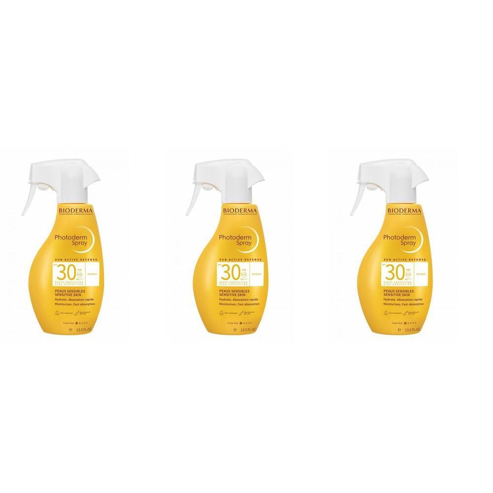 Trois sprays jaunes avec vaporisateur blanc. Inscription: Bioderma Photoderm Spray 30. Bouteilles de forme arrondie.