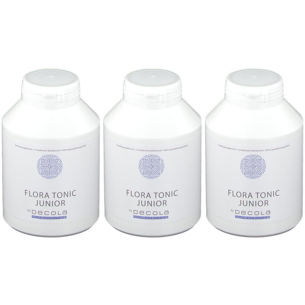 Drie witte flessen met schroefdop. Op elke fles staat "FLORA TONIC JUNIOR" en "DECOLA".