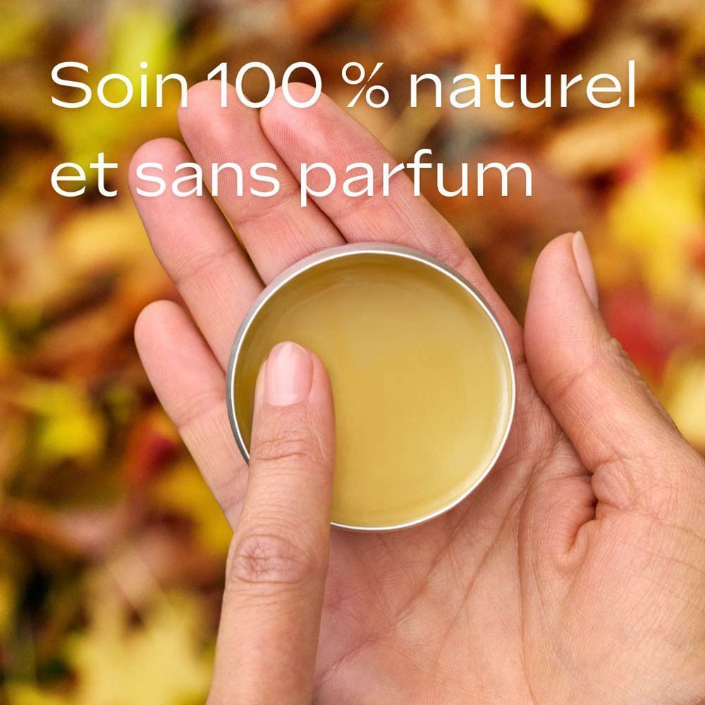 Main tenant une boîte ronde. Texte: Soin 100 % naturel et sans parfum.