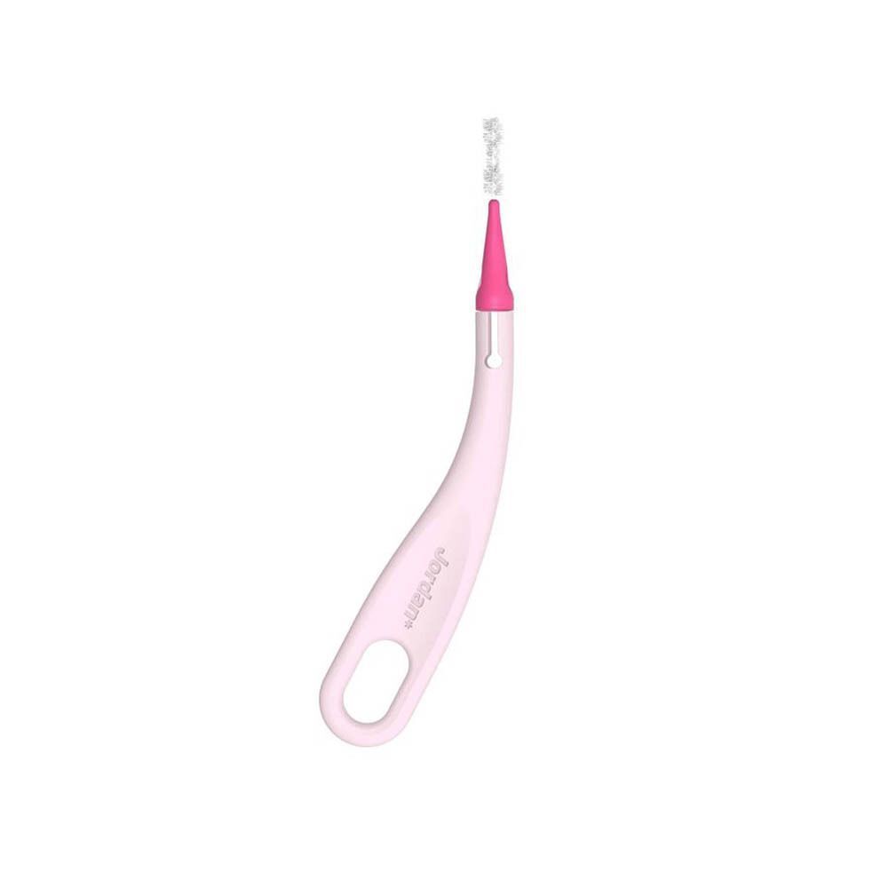 Roze interdentale borstel met handvat en borstelkop. De borstelkop is klein en puntig.