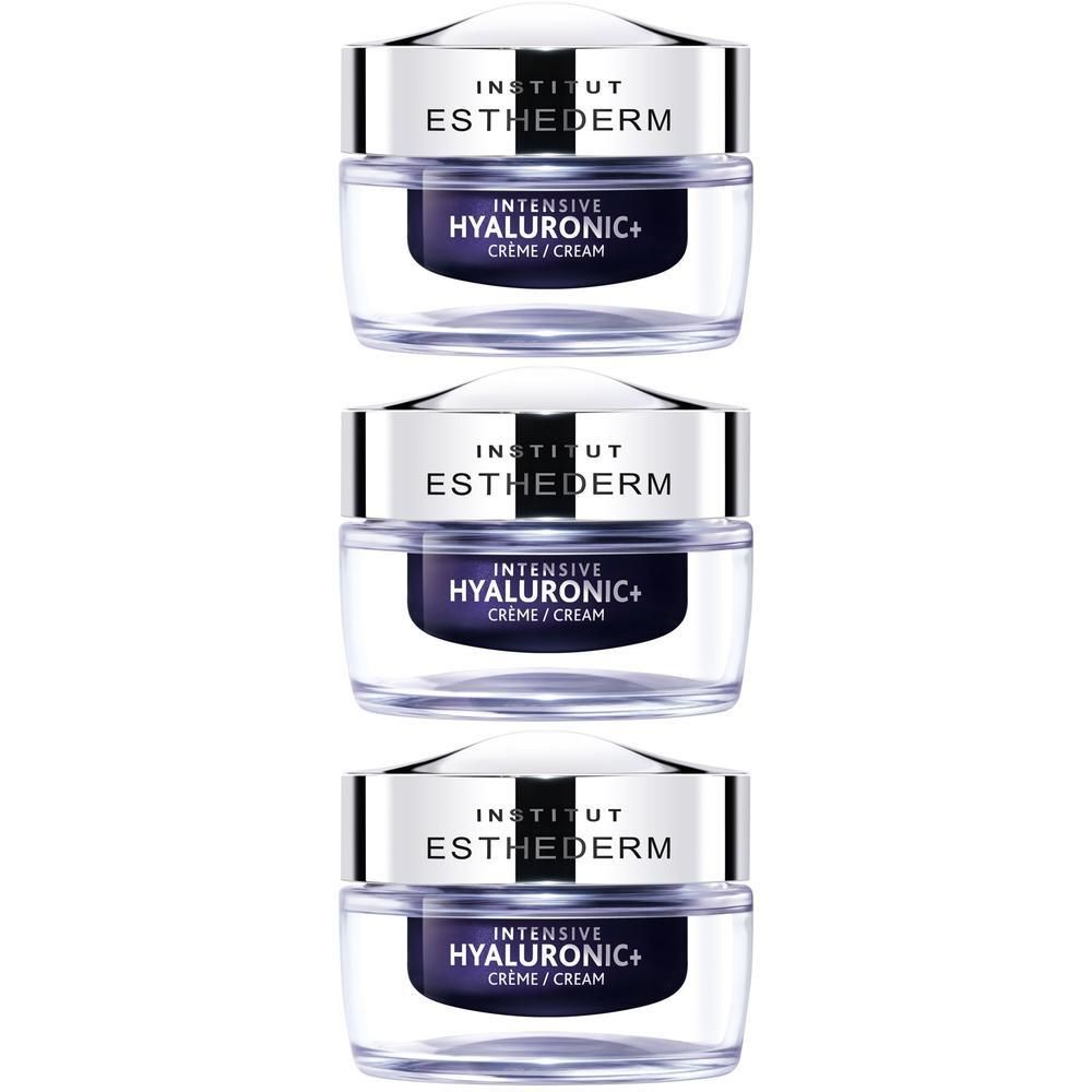 Trois pots de crème en verre, couvercle argenté. Inscription: Institut Esthederm, Intensive Hyaluronic+ Crème/Cream.