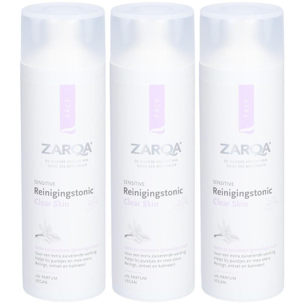 Trois flacons blancs de Zarqa Reinigingstonic Clear Skin. Étiquette lilas, bouchon transparent. Inscription: Sensitive, 0% Parfum, Vegan.