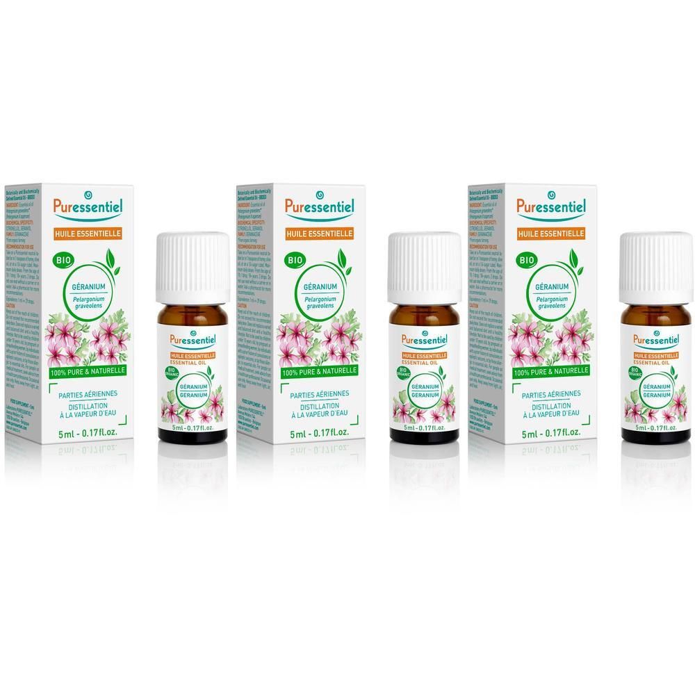 Verschillende flesjes en verpakkingen van essentiële olie. Op de verpakkingen staat "Puressentiel Géranium Huile Essentielle Bio".