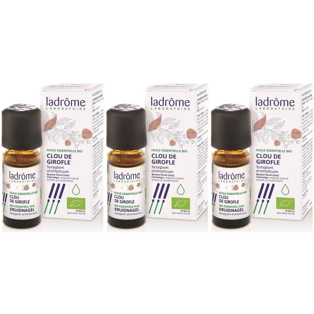 Trois flacons avec bouchon noir et étiquette, accompagnés de trois boîtes avec informations et logo.