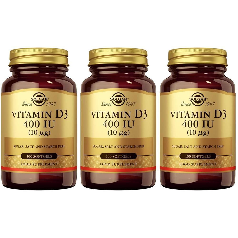 Trois flacons de Solgar Vitamine D3. Bouteilles en verre brun avec couvercles et étiquettes dorés. Inscription : Vitamine D3 400 UI.