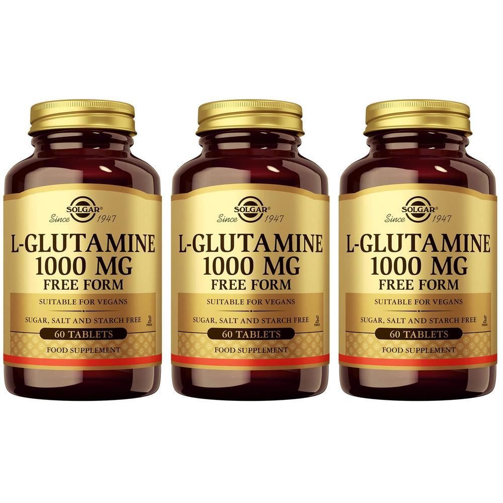 Trois flacons en verre brun avec des couvercles dorés. Les étiquettes indiquent "L-Glutamine 1000 mg" et "Solgar".