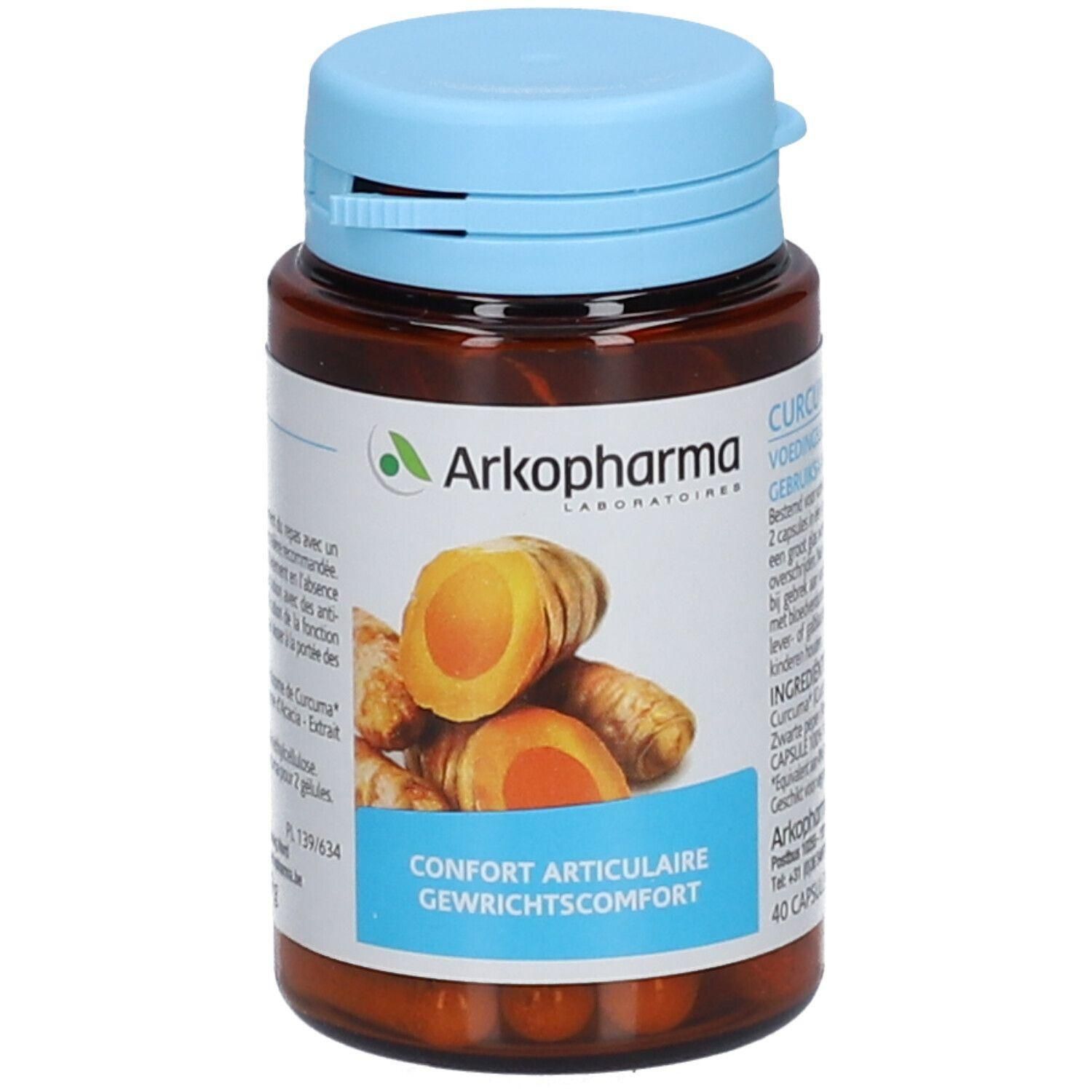 Bruine fles met blauwe dop. Opschrift: Arkopharma, Curcuma, Confort Articulaire, Gewrichtscomfort. Illustratie van kurkumawortels.