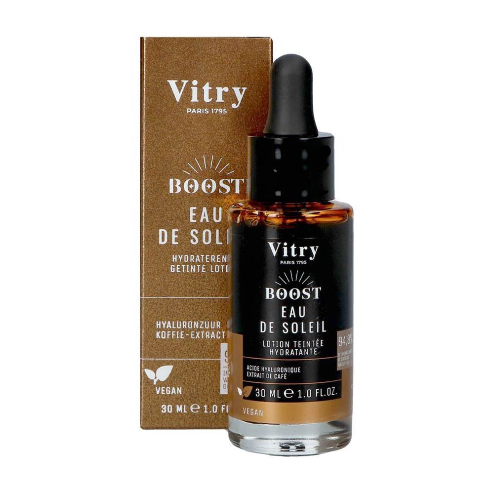 Flacon brun avec pipette et boîte dorée. Inscription: Vitry Boost Eau de Soleil, 30 ml, vegan. Avec acide hyaluronique.