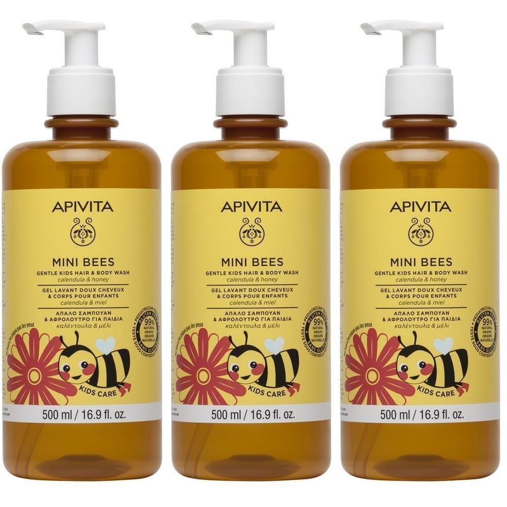 Drie flessen haar- en bodywash voor kinderen. Gele etiketten met productnaam en illustraties. Witte pompen.