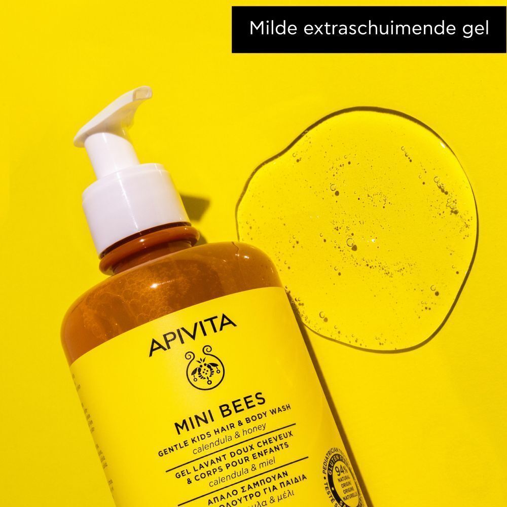 Fles haar- en bodywash voor kinderen met geel etiket en witte pomp. Daarnaast een transparante gelproef.